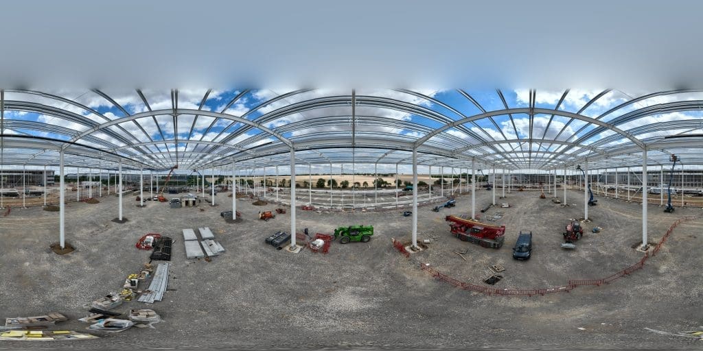 A 360 degree wide shot of inside a logistics building.