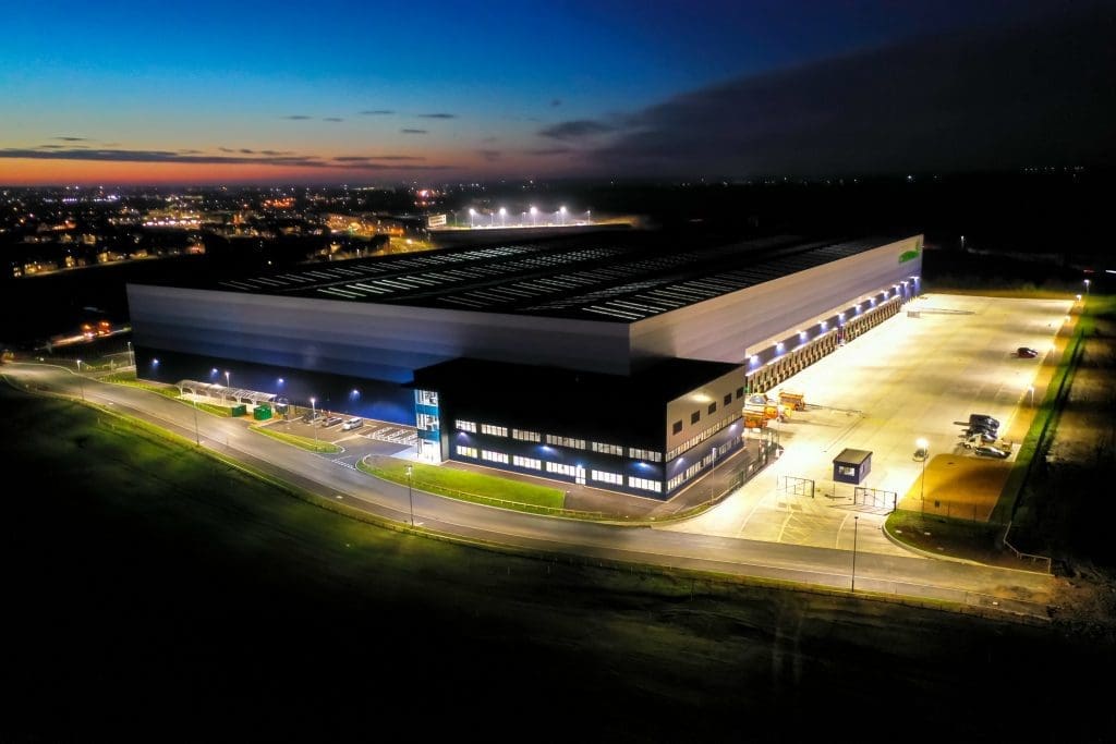 Aerial image of a completed large-scale commercial storage facility at night