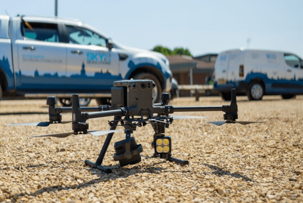 Drone in front of Sky Revolution's trucks.