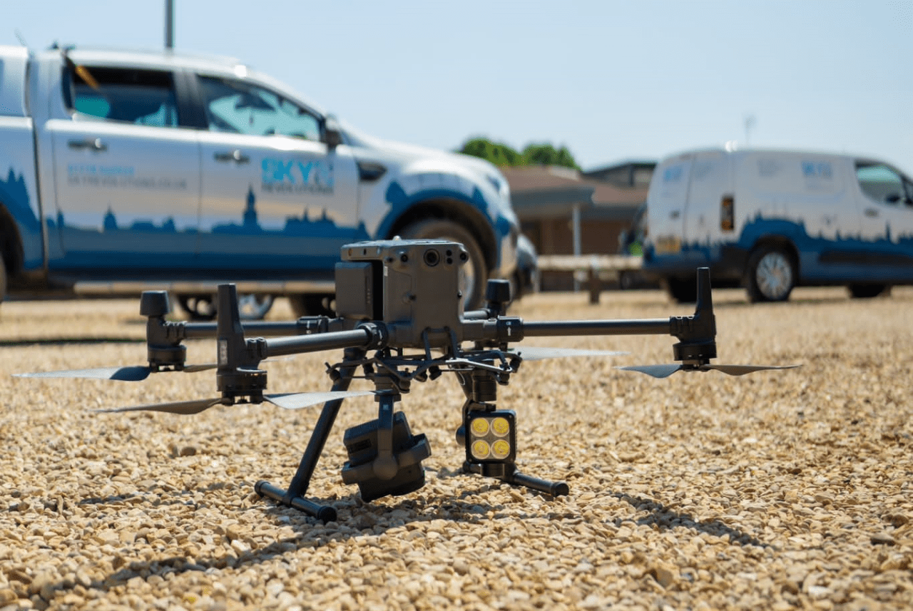 Drone in front of Sky Revolution's trucks.